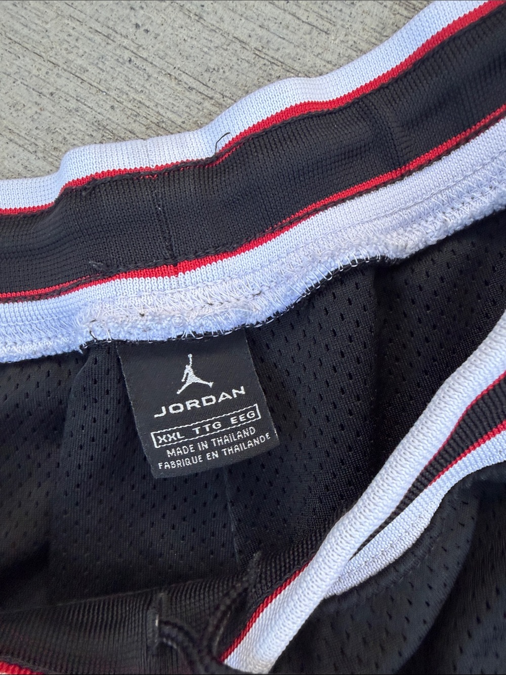 Jordan Black Basketball Shorts with Red & White Trim - Picture 2 of 4